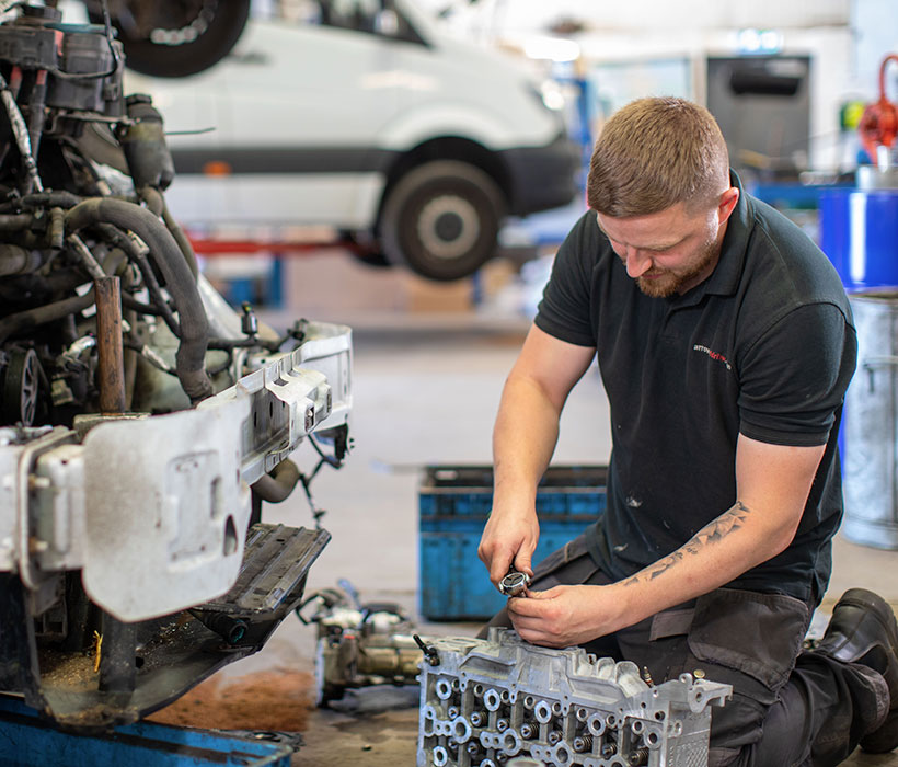 Mechanic repairing an engine
