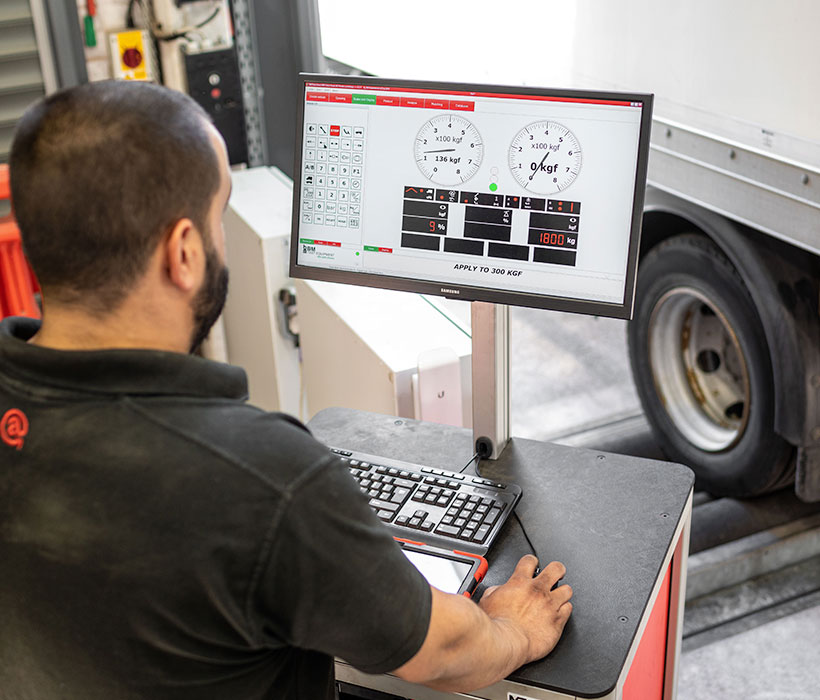 Mechanic testing a vehicle